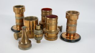 Two brass Fyrex Universal hose diffuser nozzles, three hose couplings,