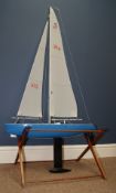 Radio Controlled Yacht, blue hull with weighted keel single mast with two sails number 274,
