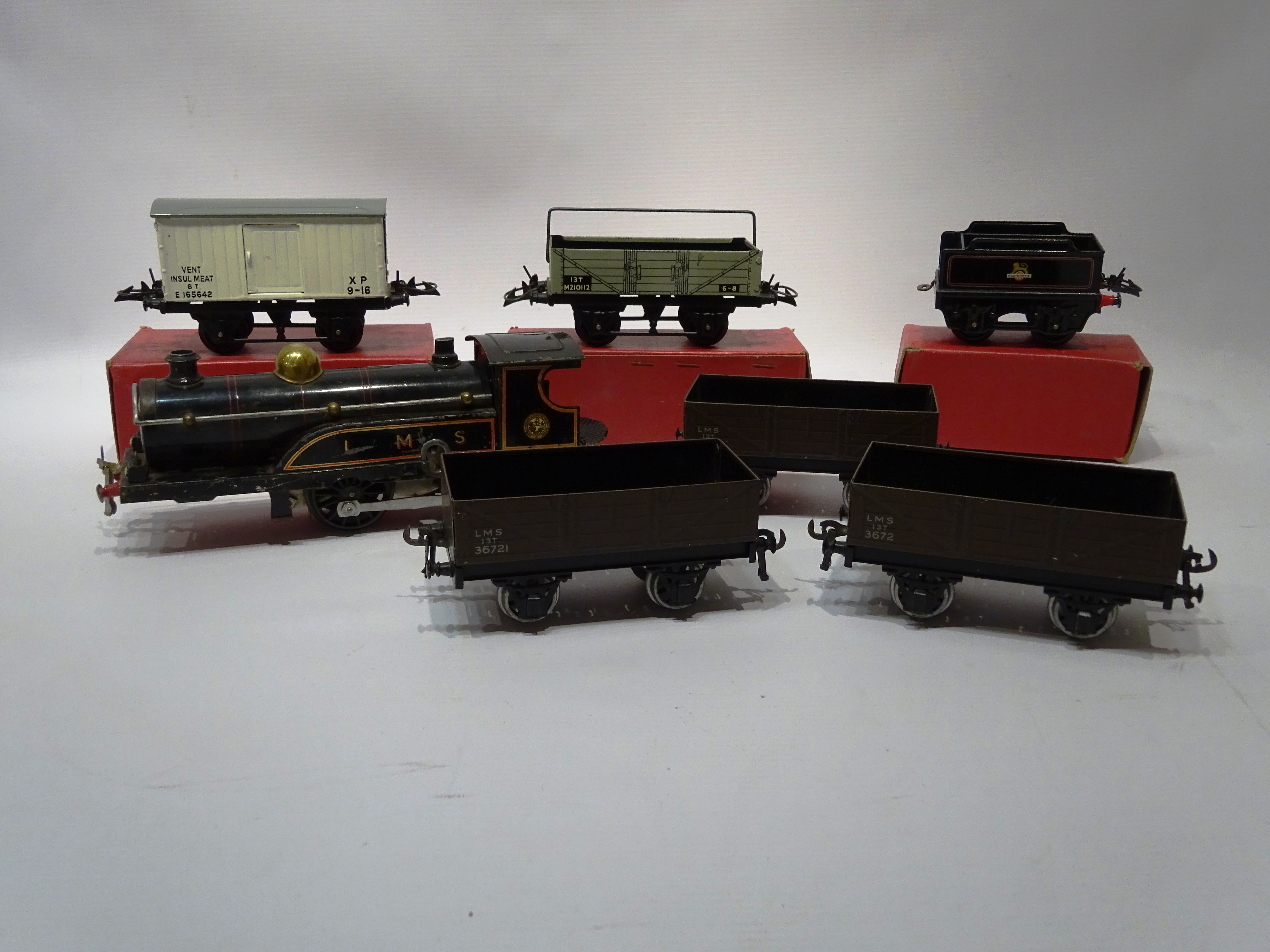 Hornby tinplate clockwork O Gauge LMS loco, & three wagons, with tender, wagon,