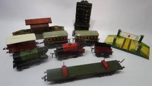 A collection of Hornby O Gauge tinplate railway including two 0-4-0 locos,