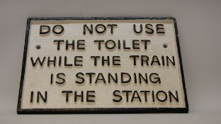 Decorative LNER cast metal sign; Do Not Use The Toilet...