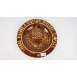 Earthenware plate slipware decorated London Midland & Scottish Railway around Rose & Thistle,