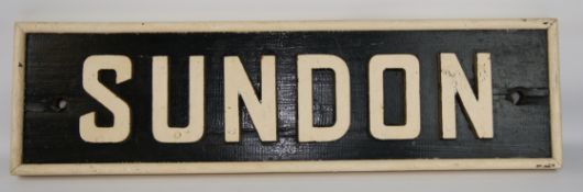 Signal Box sign 'Sundon' white cast letters on black wooden panel with white surround, W96cm,