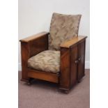 Art Deco oak framed reclining armchair fitted with double cupboard enclosing drinks holders and