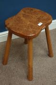 'Mouseman' oak four legged stool with shaped burr oak seat, by Robert Thompson of Kilburn,