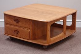 Ercol 'Windsor Pandora's Box' light finish elm square coffee table, two drawers and book storage,