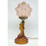 1930s amber glass lamp base semi-nude lady holding faceted shade aloft Condition Report