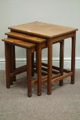 'Acornman' adzed oak nest of three tables, by Alan Granger of Brandsby,