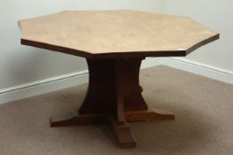 'Mouseman' adzed oak octagonal concave dining table, on cruciform base, D149cm,