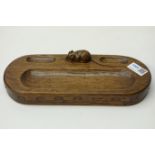 'Mouseman' oak pen tray,