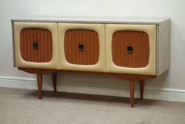 Vintage retro melamine sideboard, three padded upholstered doors, centre fall front cupboard,