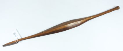 19th century Australian Aboriginal hardwood spear thrower, raised top carved with notches,