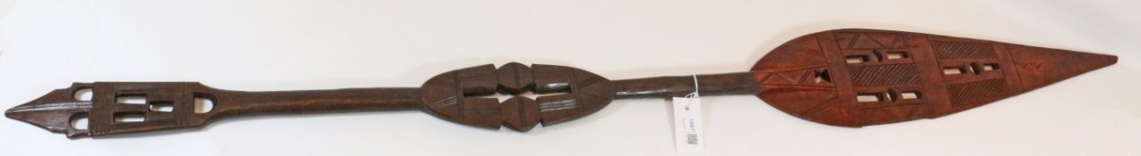 African wooden paddle with carved and pieced decoration,