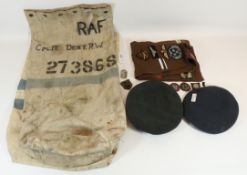 Two RAF berets one with brass badge, two RAF canvas kit bags for Cpl/T.