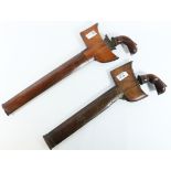 Two similar Indonesian Kris 40cm and 34cm steel blades with wooden scabbards Condition
