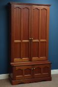 Mid to late 20th century mahogany gun cupboard, panelled doors, with six military style drawer,