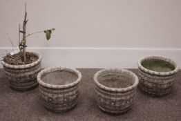 Set four composite stone planters with flower motifs Condition Report <a