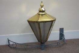 Large 20th century Victorian style brass finish street lantern, shaped wrought metal wall bracket,