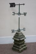 19th century weather vane, mounted on carved sandstone plinth,