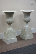 Pair Victorian style white finish cast iron urns on plinths D57cm,