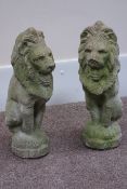 Pair composite stone seated garden lions, H54cm Condition Report <a href='//www.