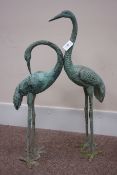 Antique finish pair cast metal herons,