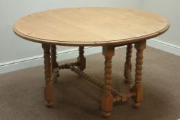 Pine drop leaf dining table, on barley twist gateleg base,