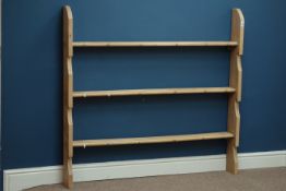 20th century waxed pine three heights wall hanging plate rack, W125cm, H118cm,