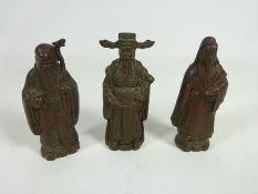 Three Chinese bronze Immortals, representing Longevity, Wealth and Happiness,