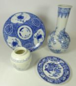 19th Century blue and white Japanese shallow dish and another Japanese bottle vase decorated with