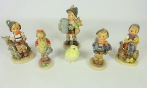 Five Hummel figures and a German porcelain chick (5) Condition Report <a