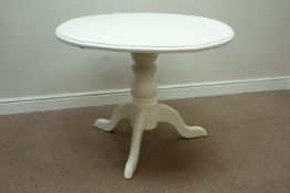 Circular painted pine dining table on turned pedestal with three splayed legs, D104cm,