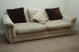 Three seat sofa upholstered in beige fabric (W245cm), and matching armchair (W100cm),