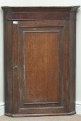 Georgian oak and mahogany banded corner cabinet, panelled single door, W74cm,