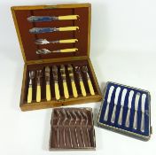 Set of six fish knives & forks with silver collars in oak case,
