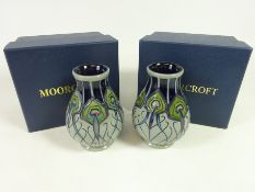 Pair of Moorcroft grey ground 'Blue Peacock Parade' vases, in boxes,