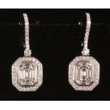 Pair of baguette and round diamond cluster drop ear-rings stamped 750 Condition Report