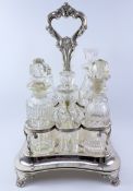 Early Victorian silver cruet stand by John James Keith London 1840 four original cut glass bottles