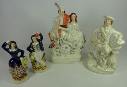 19th Century Staffordshire flatback figure group of a Highlander and his wife,