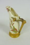 Royal Worcester tusk jug with gilt branch handle on ivory ground H15cm Condition Report