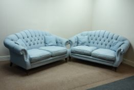 Pair Lincoln House traditional shaped two seat sofas upholstered in blue button back fabric,