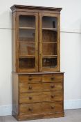 Victorian mahogany bookcase on chest, two short and three long drawers enclosed by two glazed doors,