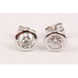 Pair of diamond ear-rings white gold surrounds stamped 750 approx 1.
