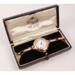 Early 20th century hallmarked 9ct gold enamel face wristwatch the expanding bracelet dated 12 Dec