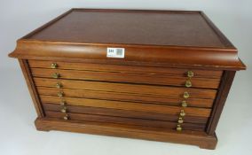 Mahogany seven drawer collector's chest, W52.