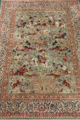 Persian design hunting rug, silk and cotton, decorated with animals,