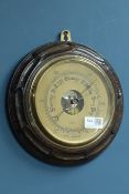 Dollond London aneroid barometer in carved oak case, D25cm CLOCKS & BAROMETERS - as we are not a re