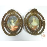 Two 19th Century miniature portraits on ivory in matching gilt frames,