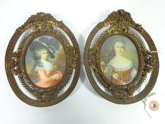 Two 19th Century miniature portraits on ivory in matching gilt frames,