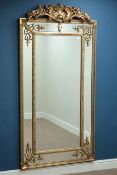 Large rectangular wall mirror in ornate gilt cushion frame with pediment, W92cm,